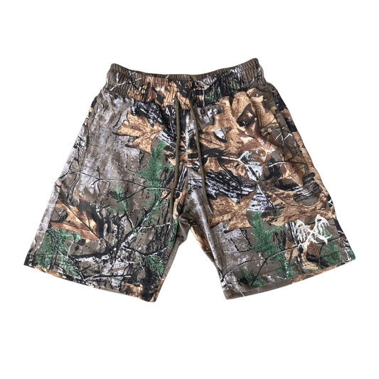 Camouflage shorts with green drawstrings and white logo on the left leg