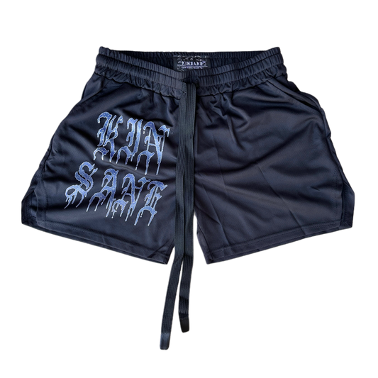 Black athletic shorts with elastic waistband and black drawstrings and blue lettering reading “KINSANE” on the right leg
