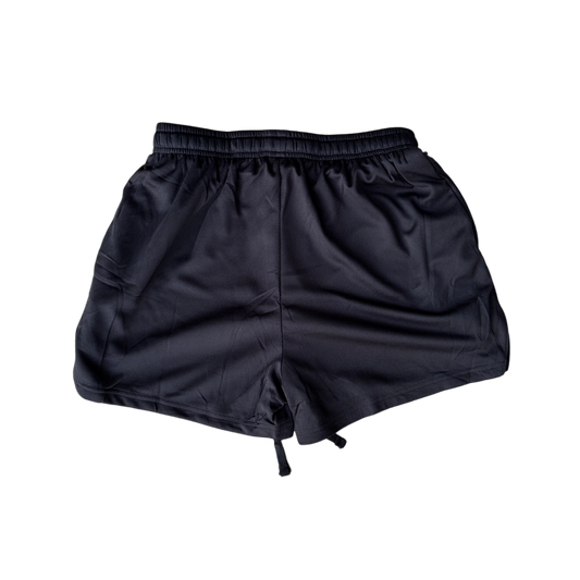 Back view of plain black athletic shorts