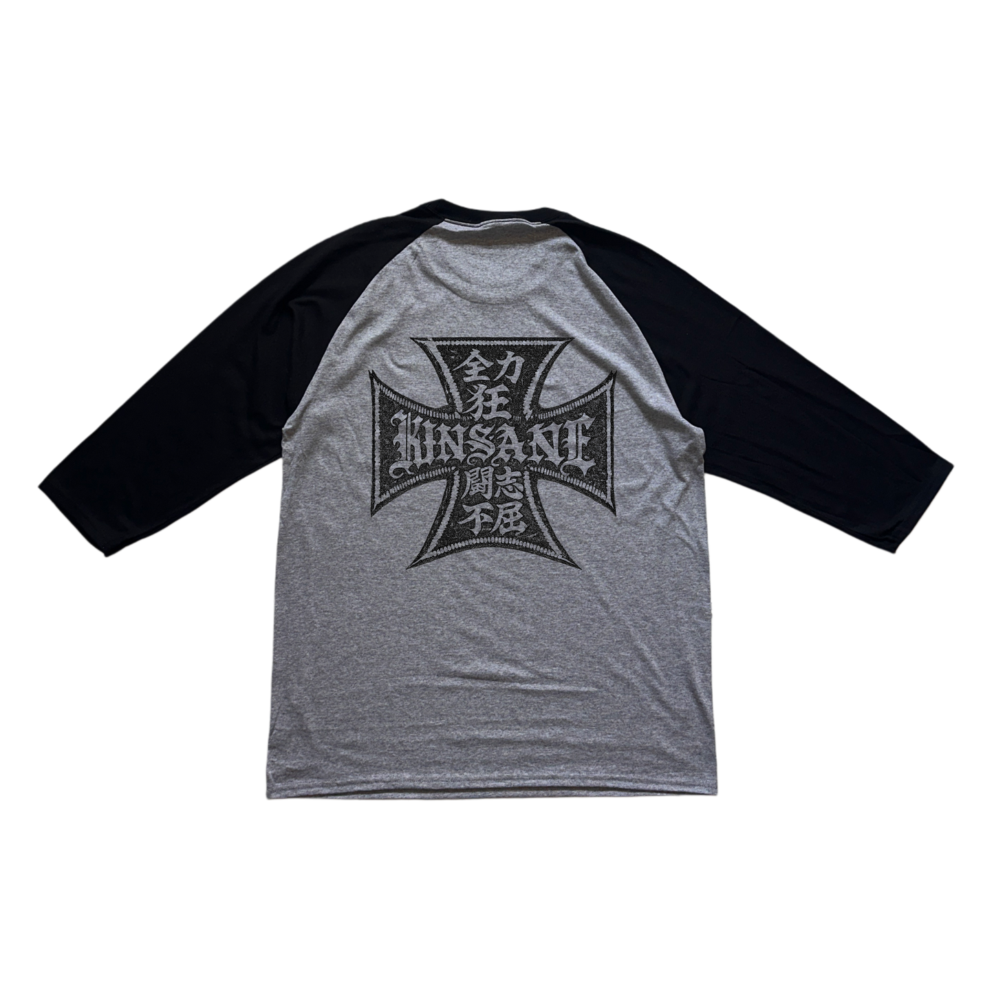 Back view of black and gray baseball raglan shirt with black logo with Japanese text and text reading “KINSANE”