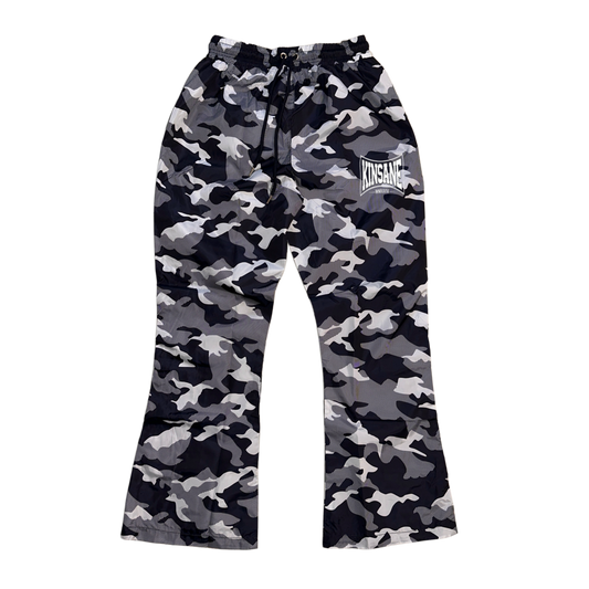 Camo baggy sweatpants with white logo lettering on the right side reading “KINSANE MMXXIV”