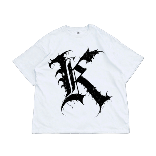 White t shirt with black letter “K” on the front