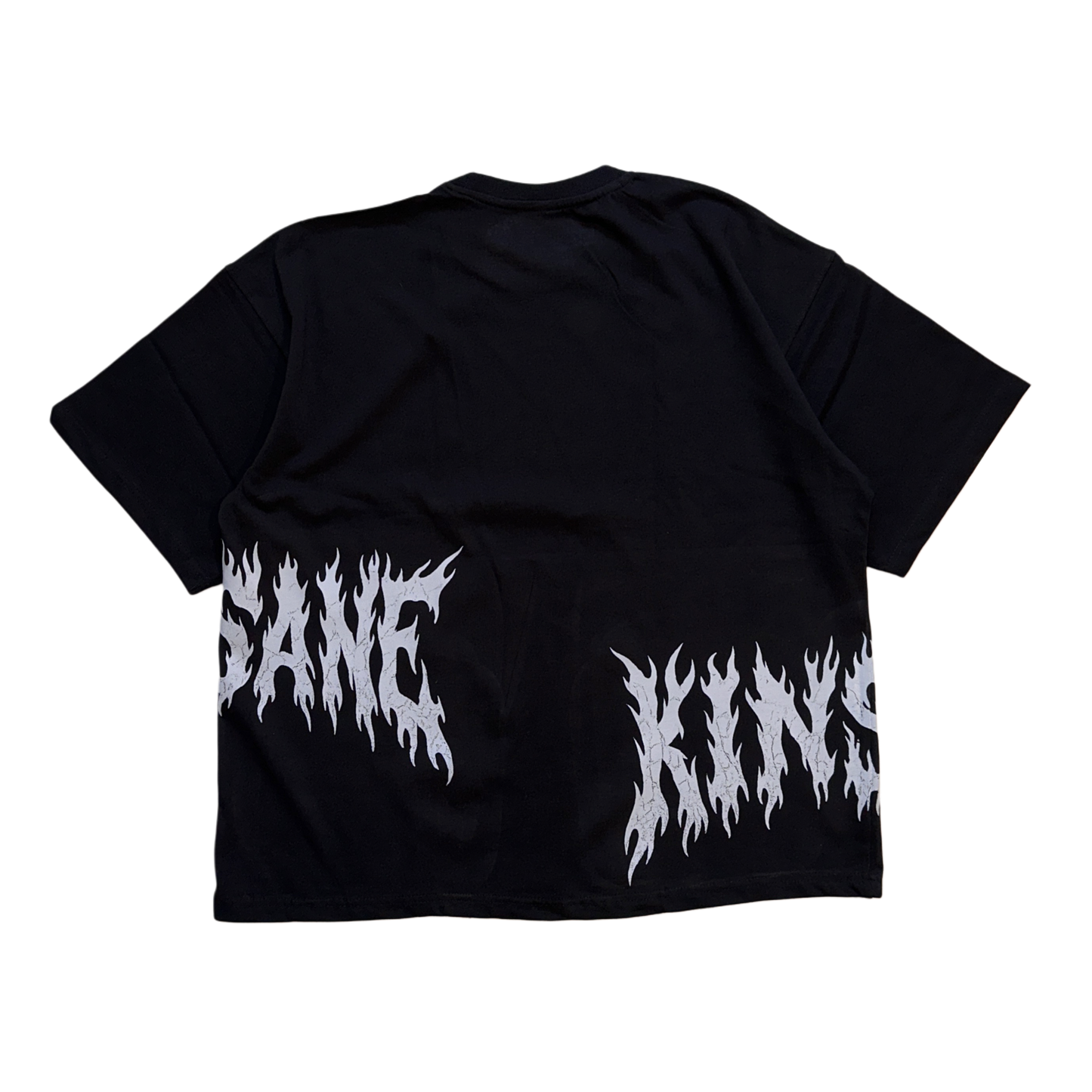 Back view of a Black T-shirt with white flamed lettering on the sides reading “KIN” and “SANE”