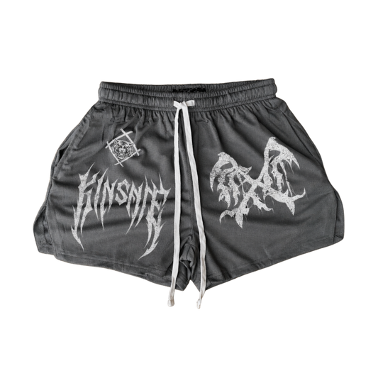Gray athletic shorts with white drawstrings and a white logo on the right side and a white logo and white text reading “KINSANE” on the left side 