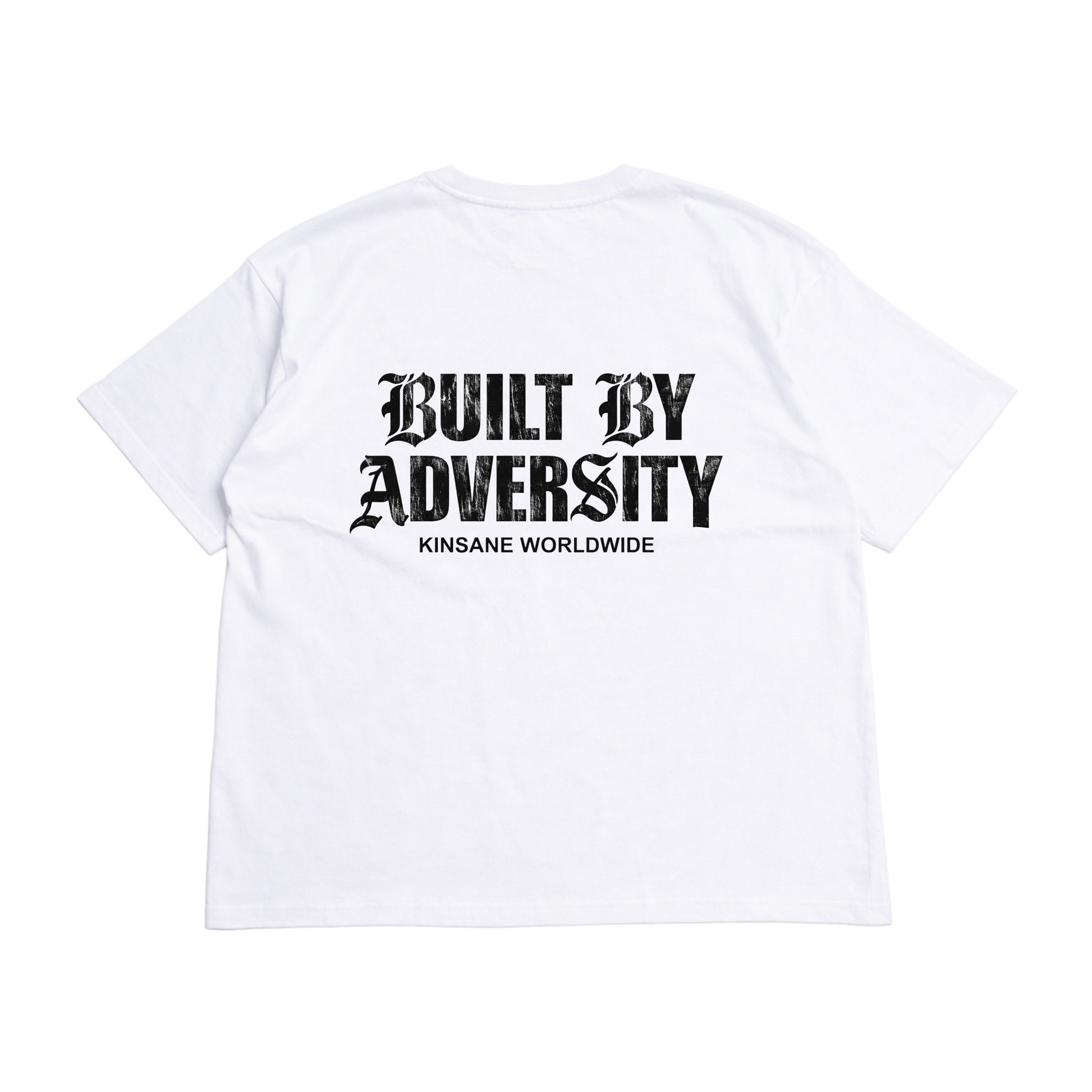 Back view of a white t shirt with black text reading “BUILT BY ADVERSITY KINSANE WORLDWIDE” 