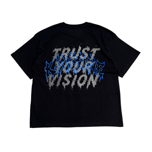 Back view of a black t shirt with white static text reading “TRUST YOUR VISION” and blue outlined text reading “KINSANE” 