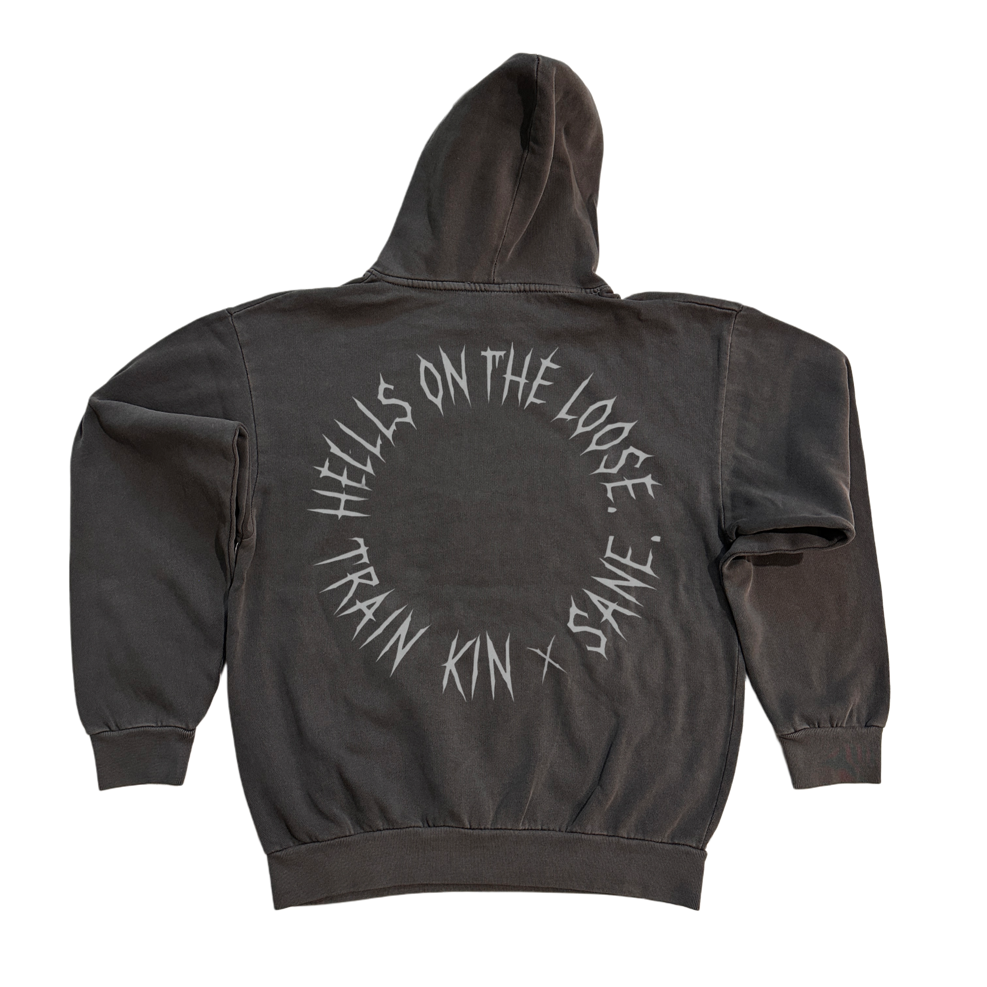 Back view of a dark grey hoodie with silver text in a circle reading “HELLLS ON THE LOOSE. TRAIN KIN X SANE” 