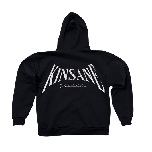 Back view of a black hoodie with white text reading “KINSANE TEKKIN” 