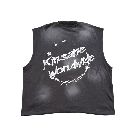 Back view of a vintage washed grey shirt with white text and star / barbed wire logo reading “KINSANE WORLDWIDE” 