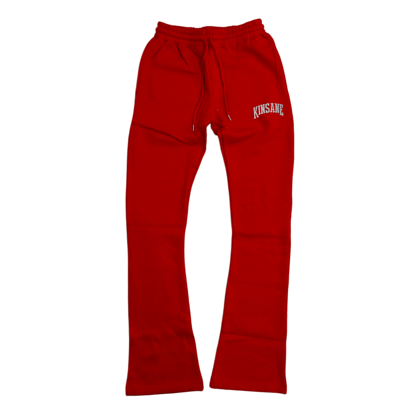 Red stacked sweatpants with white lettering reading “KINSANE” on the right side 