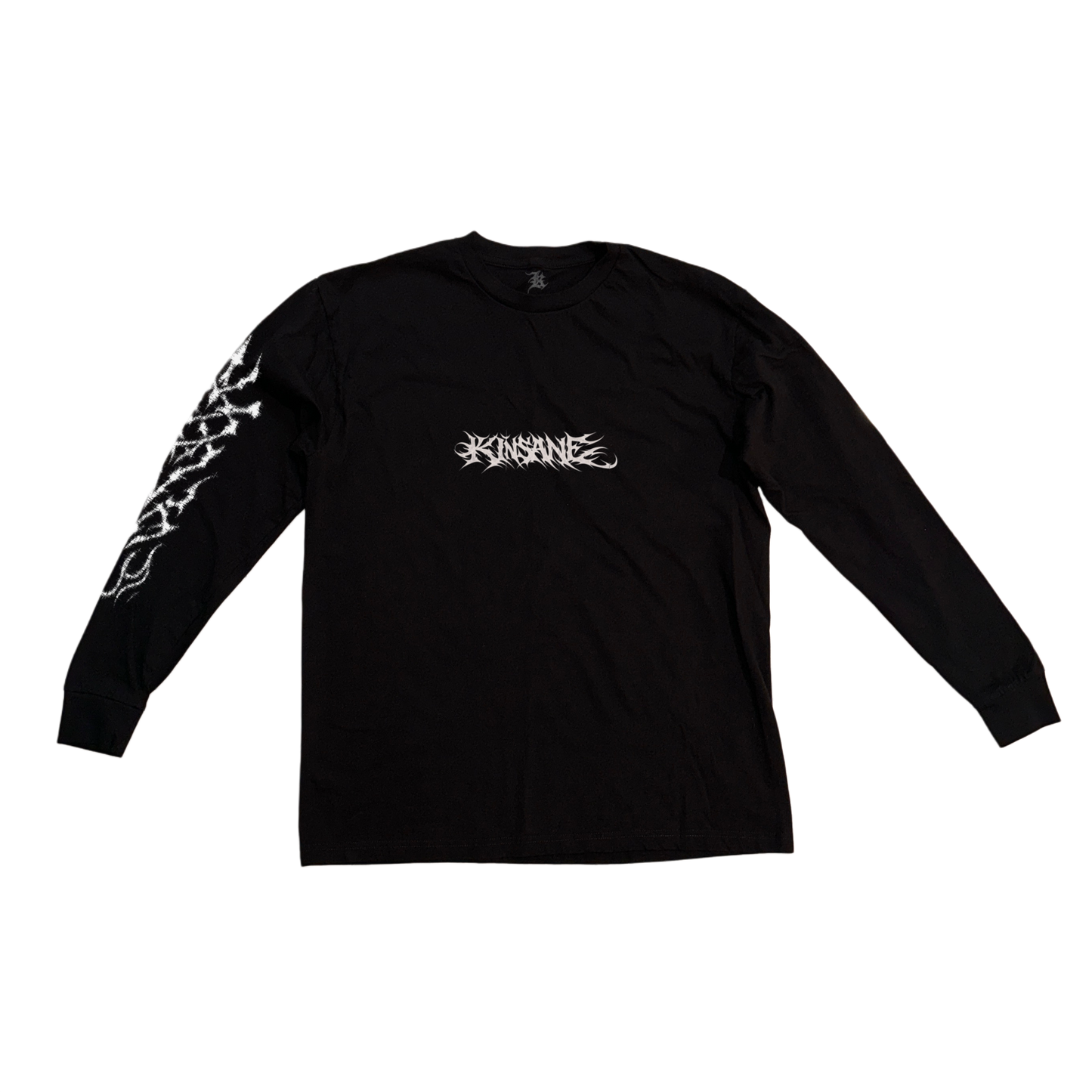 Black long sleeve T-shirt with white tribal lettering reading “KINSANE” in the center and white tribal designs on the right sleeve 