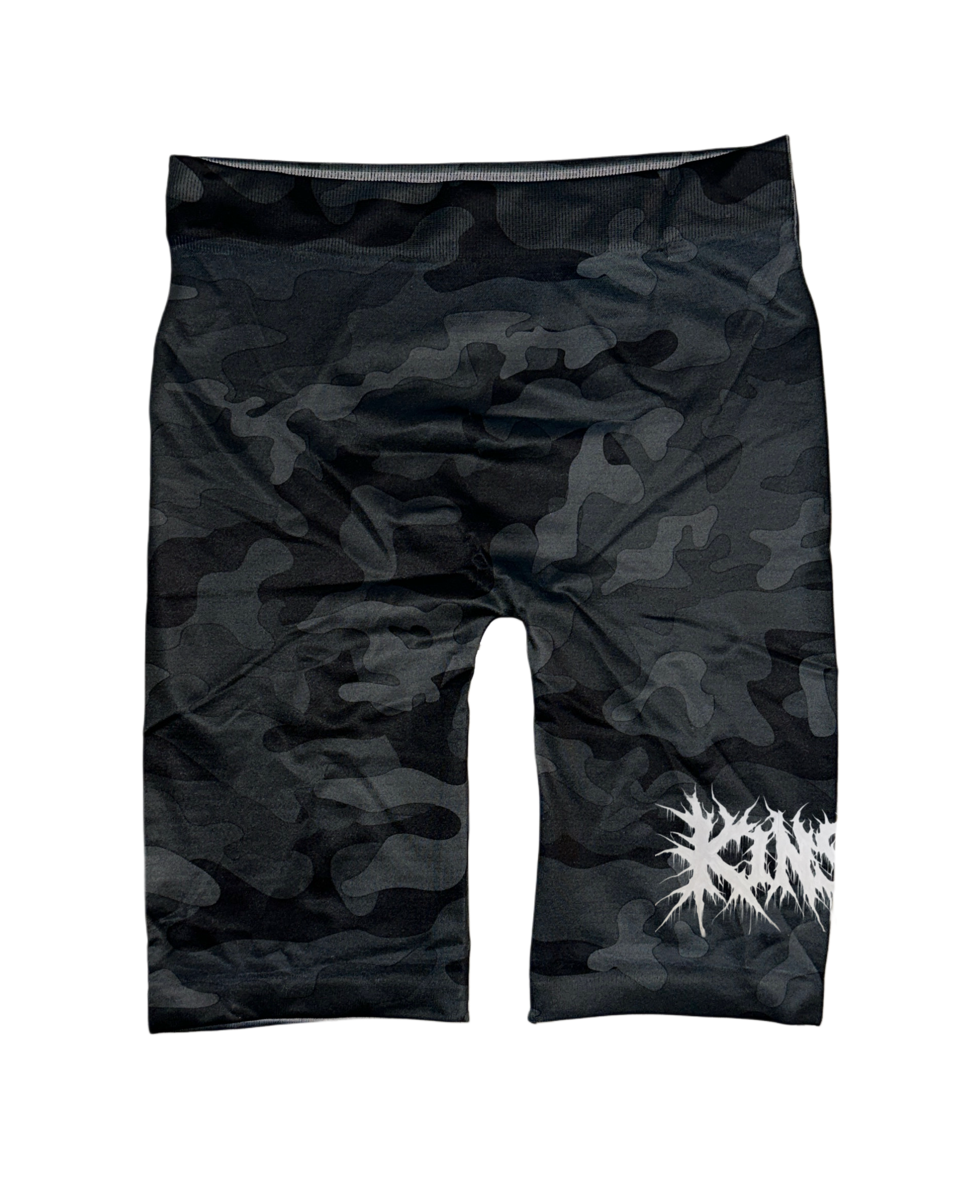 Black and grey camo compression shorts with white chaotic lettering reading “KIN” on the right leg 