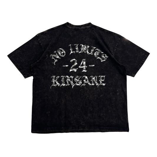 Back view of a black acid washed t shirt with camo filter text reading “NO LIMITS -24- KINSANE” 