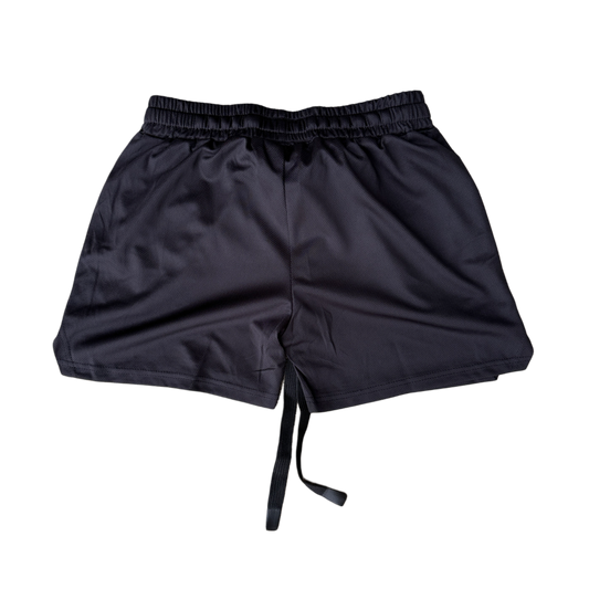 Back view of black athletic shorts 