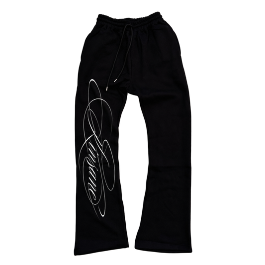 Black stacked sweatpants with white printed cursive font reading “Kinsane” on the left side 
