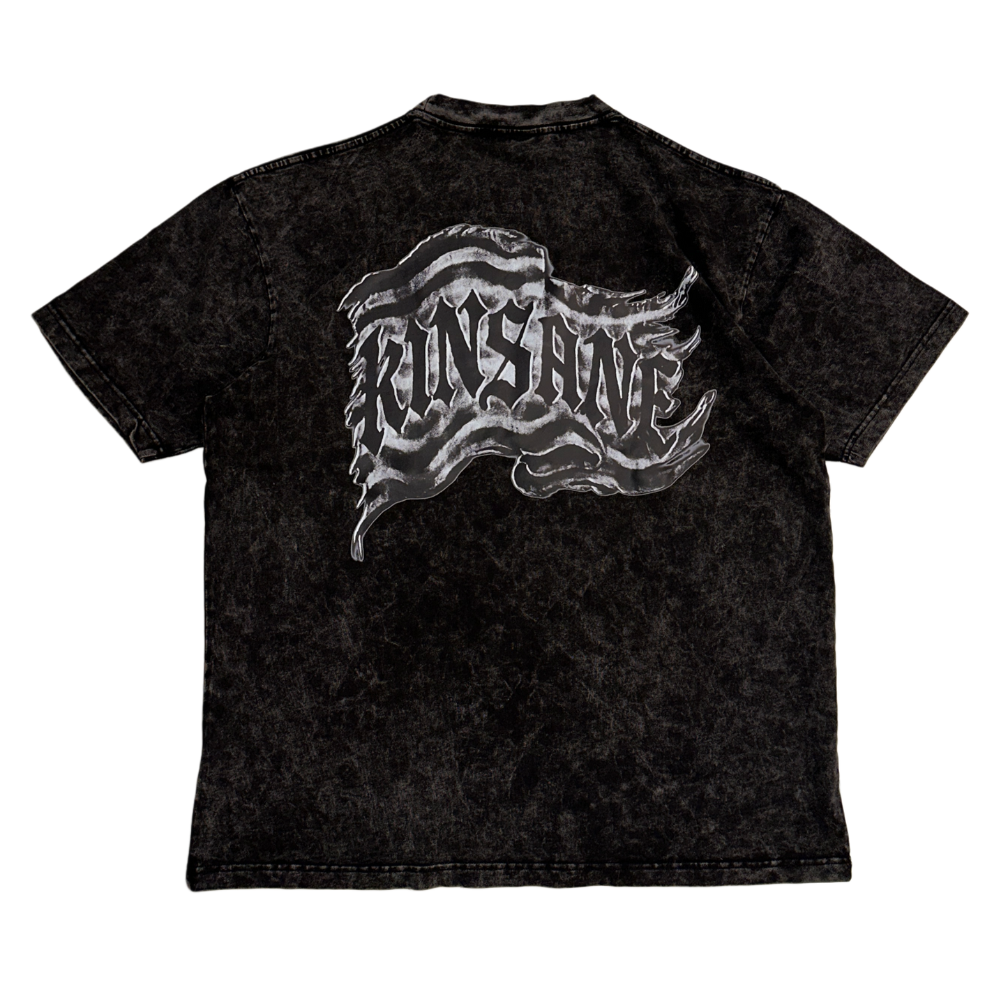 Back view of a black acid washed t-shirt with a black and white flag and black lettering reading “KINSANE” 