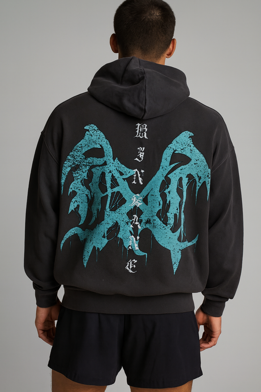 Back view of a guy wearing a dark grey hoodie with a teal logo and white text reading “KINSANE” 