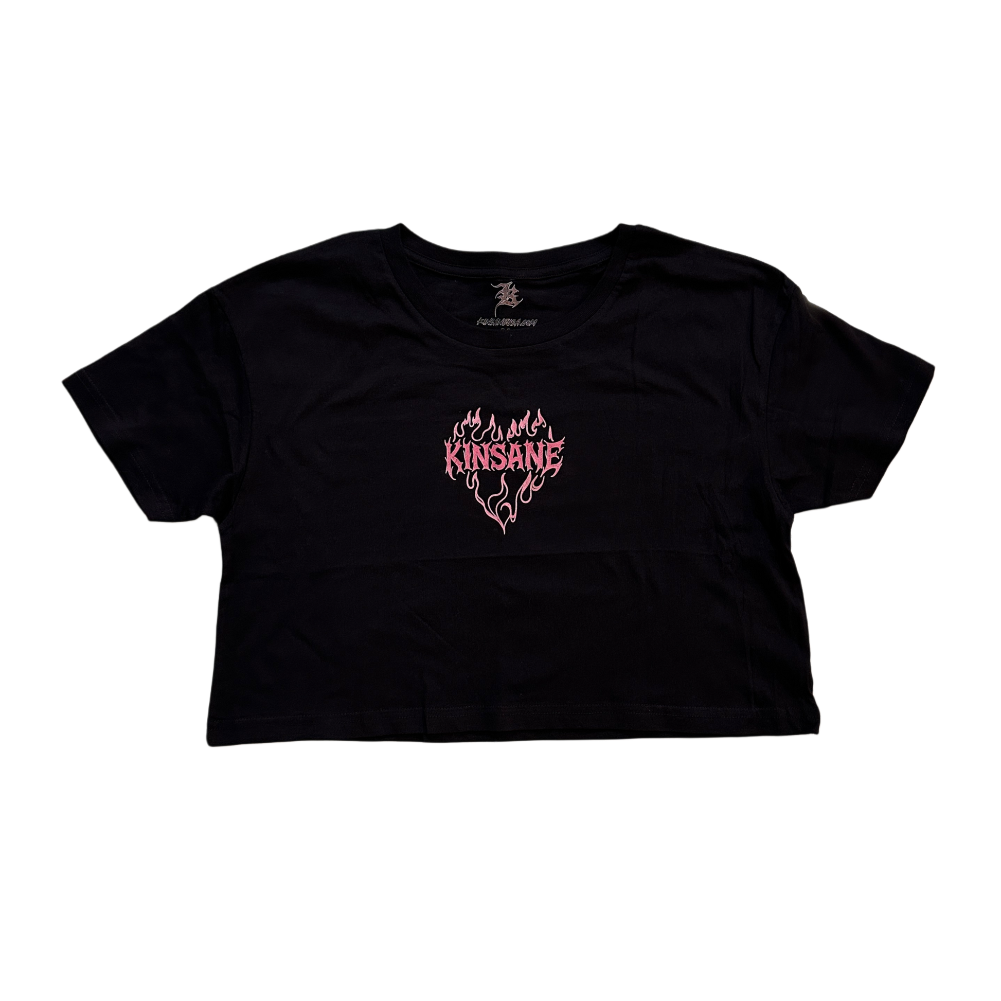 black crop top T-shirt with pink lettering reading “KINSANE” surrounded by pink flames in the shape of a heart 