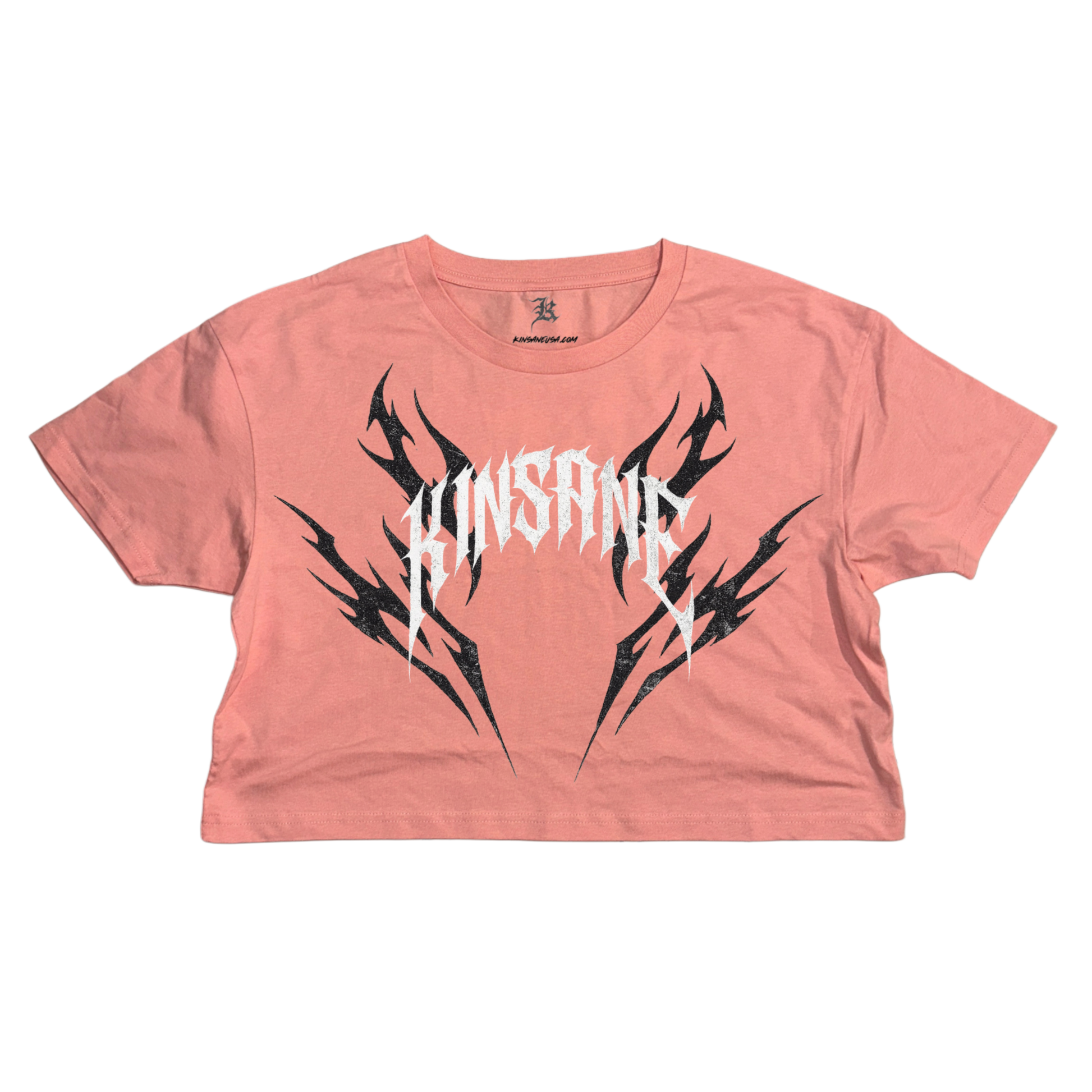 pink crop top T-shirt with black tribal designs and white lettering reading “KINSANE” 