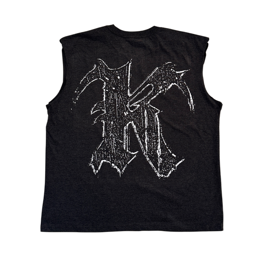 Back view of a dark gray sleeveless shirt with white logo in the letter “K” 
