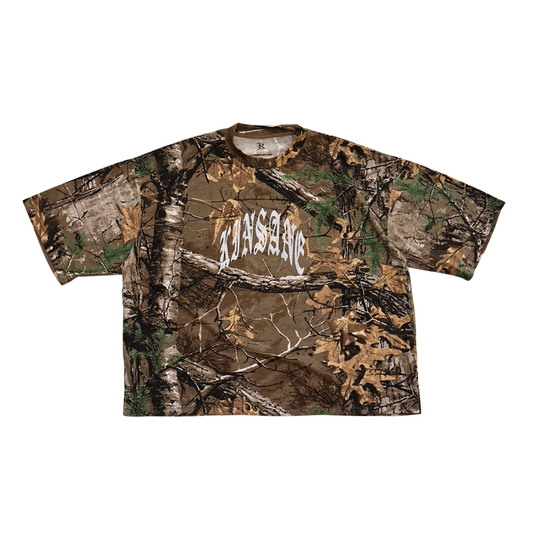 Camouflage t shirt with white text on the front reading “KINSANE”