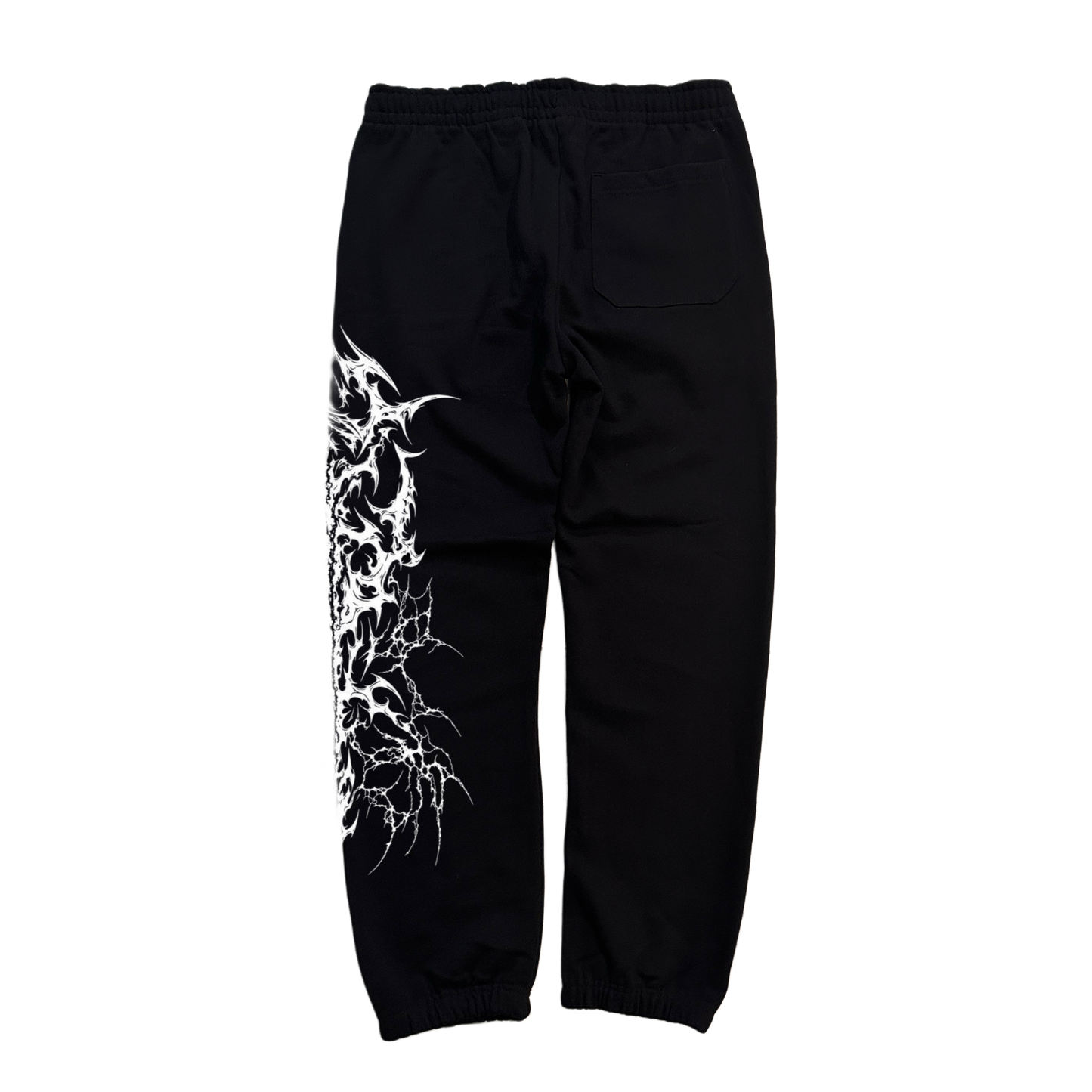 Back view of black cuffed joggers with white tribal design on the left side 