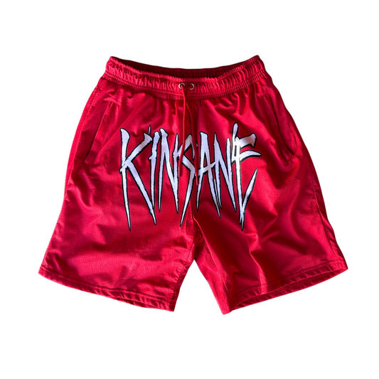 Red mesh shorts with red drawstrings and white text across the front reading “KINSANE”