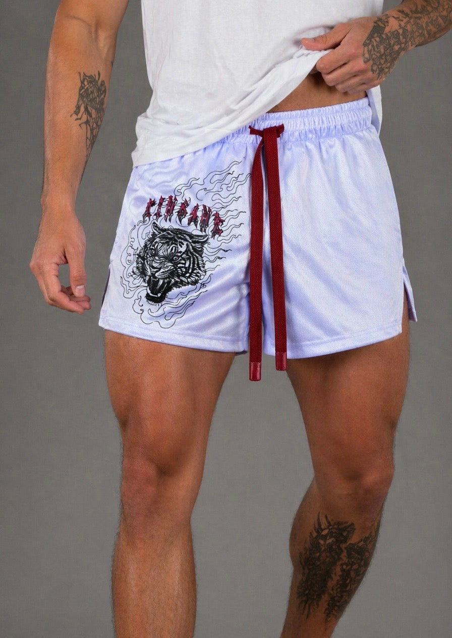 Man wearing White athletic shorts with elastic waistband and red drawstrings with a tiger design in flames on the right leg and red lettering resembling “KINSANE”