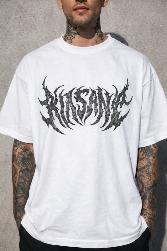 Man wearing White t shirt with dark grey lettering reading “KINSANE”