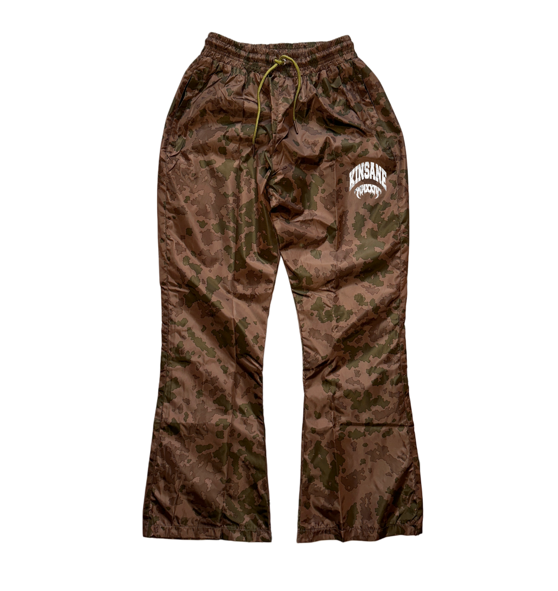 Brown camo sweatpants with green drawstrings and white text reading “KINSANE” and another white text reading “MMXXIV” on the left leg