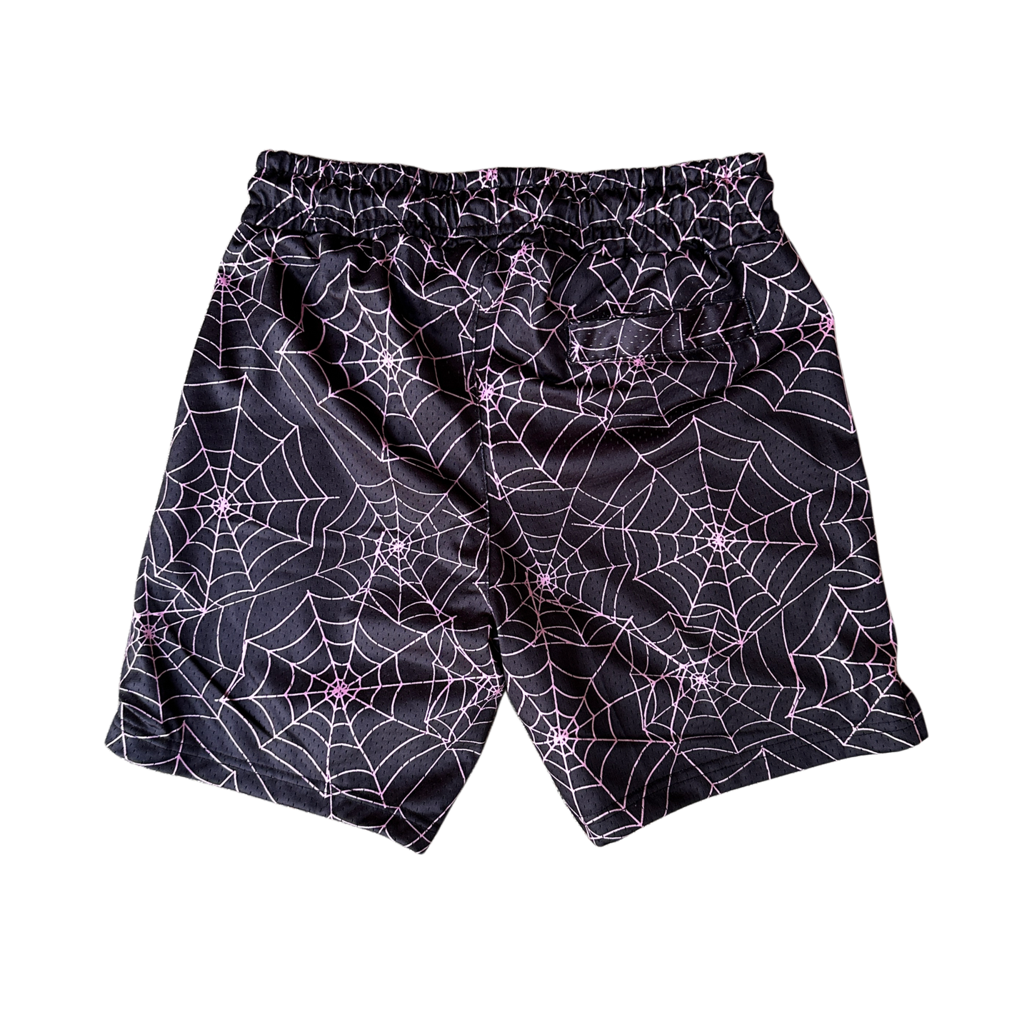 Back view of black shorts with pink web designs 
