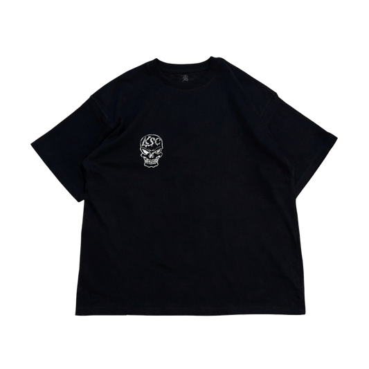 Black t shirt with white skull design and white text reading “KSC” 