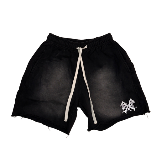 Black acid washed shorts with white drawstrings and white logo on the left leg 