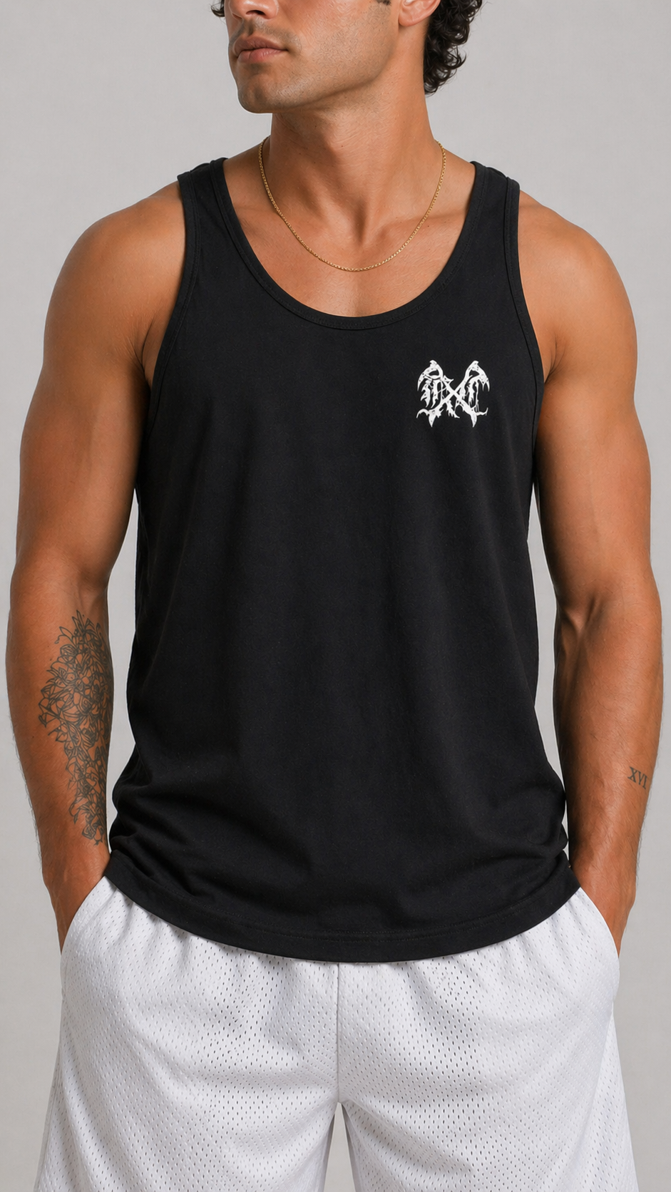 Man wearing Black tank top with white logo 