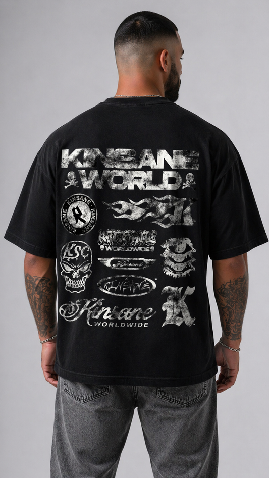 Back view of a man wearing a black t-shirt with multiple white kinsane themed logos reading “KINSANE” stacked on top of each other and white text reading “KINSANE WORLD” 