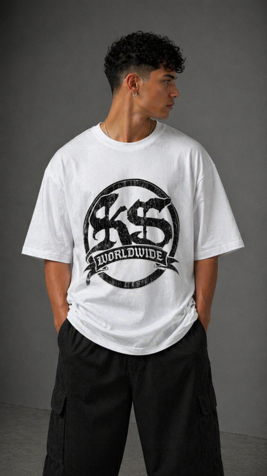 Man wearing a White t shirt with black logo and black text reading “KS” and white text reading “WORLDWIDE” 