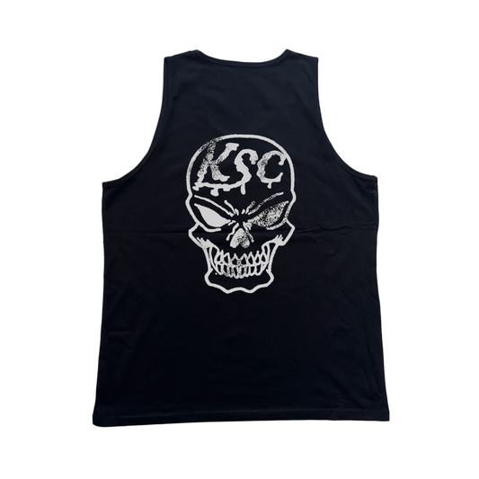 Back view of a black tank top with a white skull design and white text reading “KSC” 