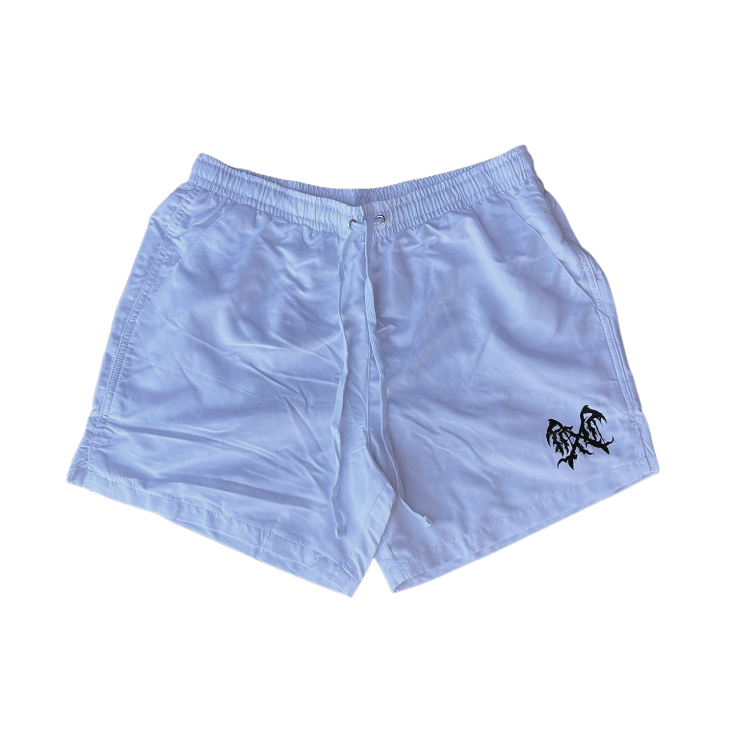 White trunks with a black logo on the left leg 