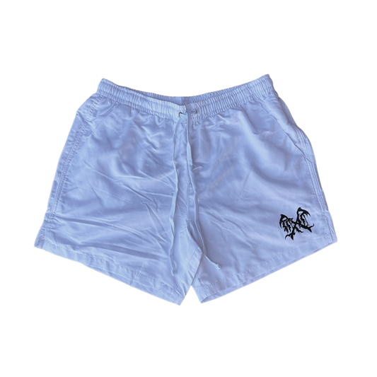 White trunks with a black logo on the left leg 