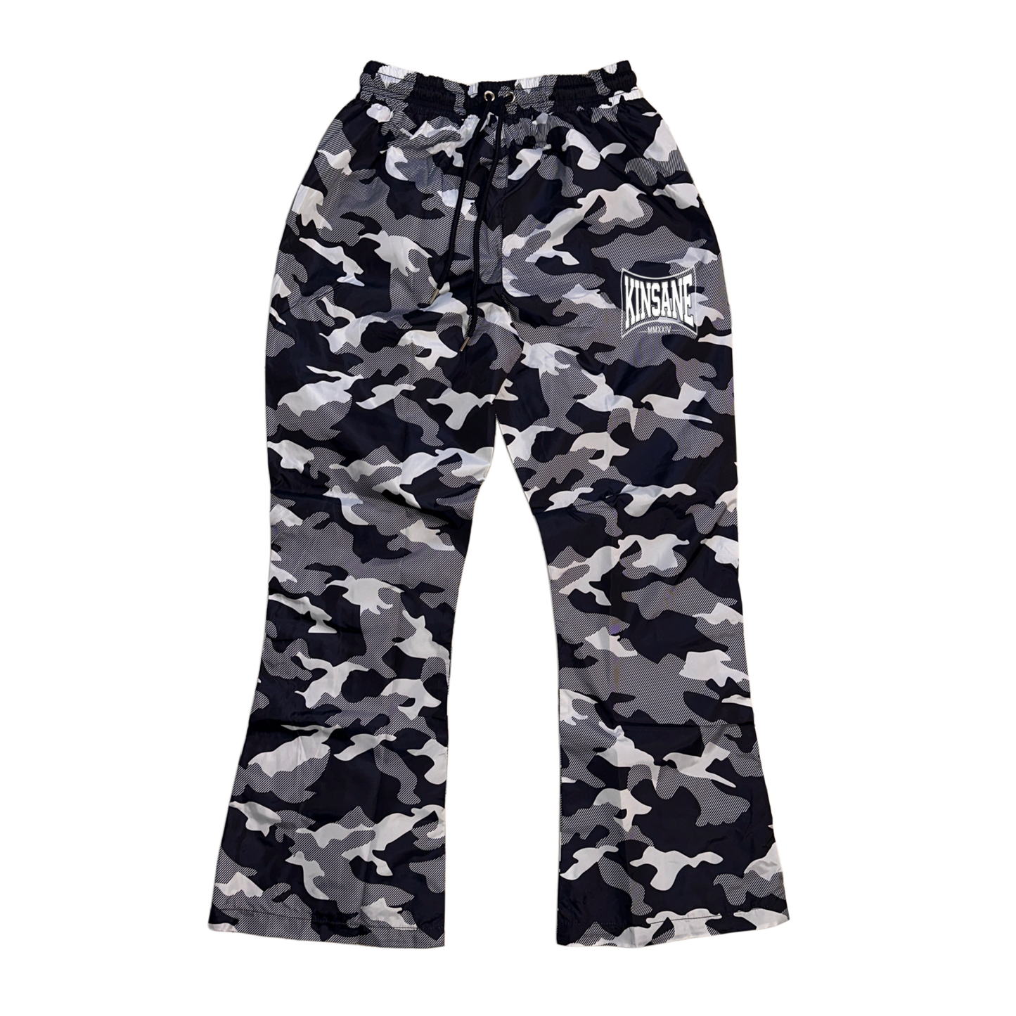Camo baggy sweatpants with white logo lettering on the right side reading “KINSANE MMXXIV” 