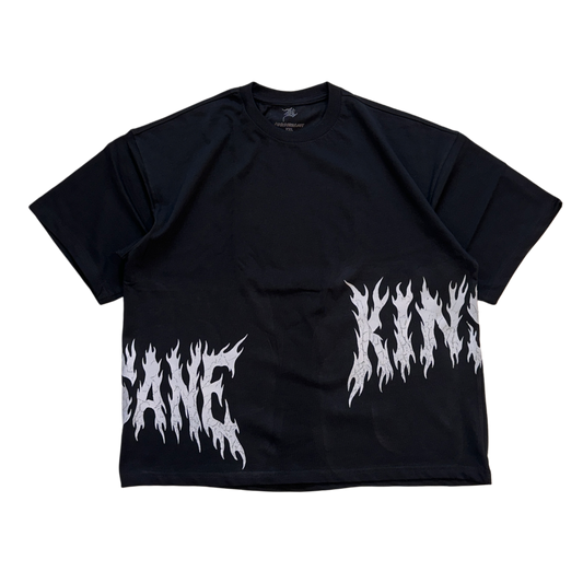 Black T-shirt with white flamed lettering on the sides reading “KIN” and “SANE” 