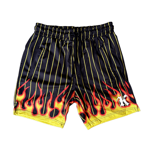 Black and yellow shorts with flames design with a white “K” logo on the right side 