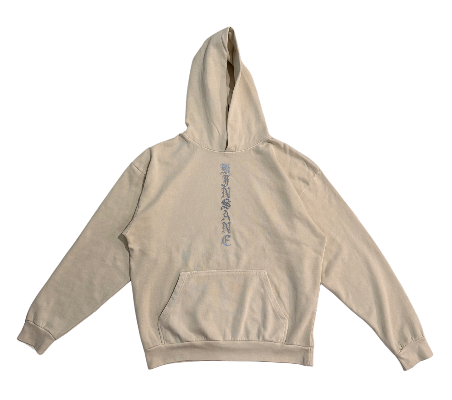 Tan hoodie with silver text reading “KINSANE” in the center 
