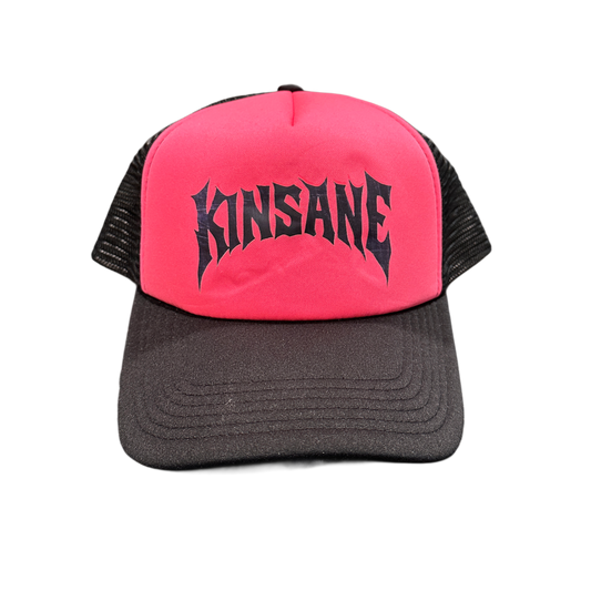 Mesh trucker hat with pink front panel and grey heavy metal lettering reading “KINSANE” 