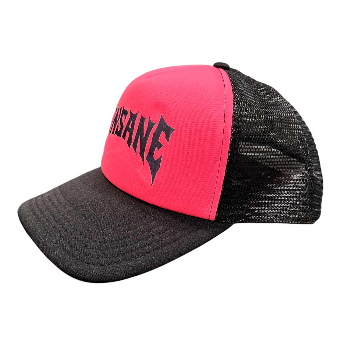 Side view of Mesh trucker hat with pink front panel and grey heavy metal lettering reading “KINSANE” 