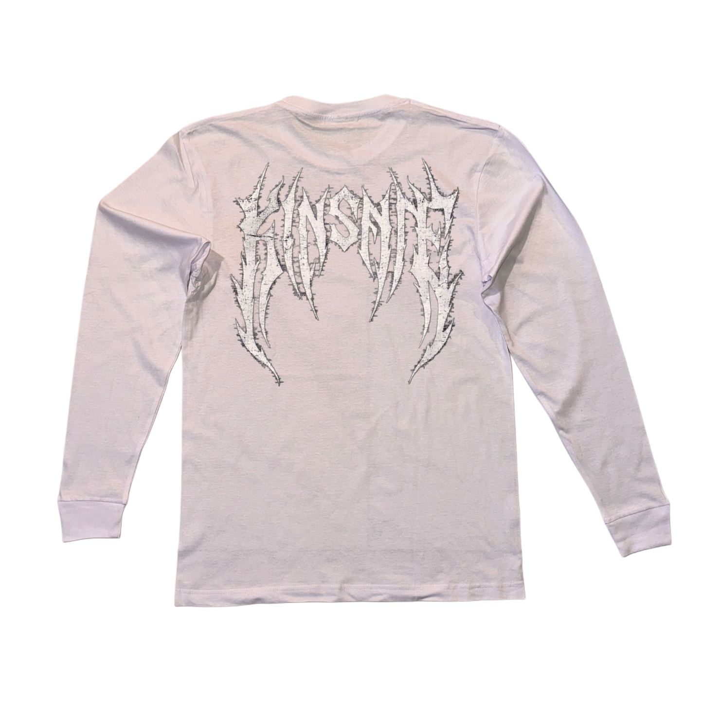 Back view of a long sleeve white T-shirt with white tribal lettering reading “KINSANE” 