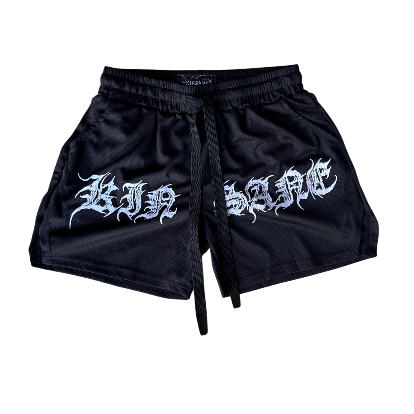 Black athletic shorts with elastic waistband and black drawstrings with white tribal lettering reading “KINSANE” across the front 