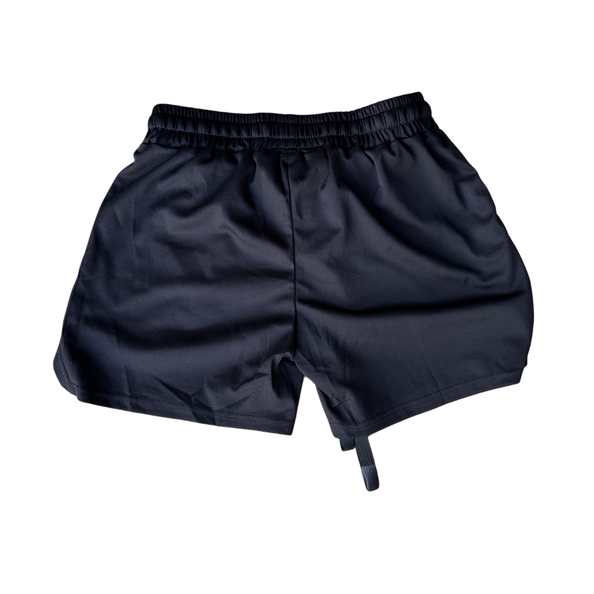 back side of black athletic shorts with elastic waistband, drawstrings