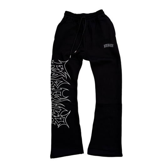 black stacked sweatpants with white outlined tribal lettering reading “forever” on the left side and white old English style lettering reading “KINSANE” on the right side 