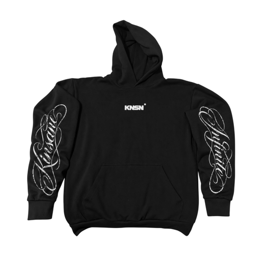 Black hoodie with white cursive texts on the sleeves reading “Kinsane” and “Infinite” and small text on the front reading “KNSN*”